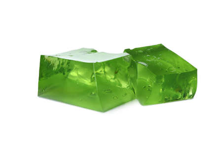Cubes of kiwi jelly isolated on white backgroundの写真素材