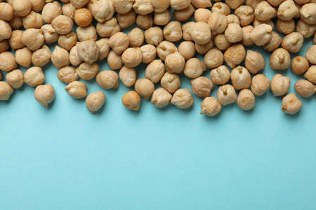 Fresh chickpea on blue background, space for textの写真素材