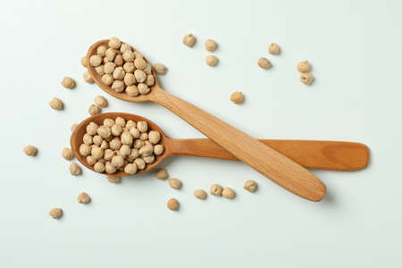 Spoons with fresh chickpea on white backgroundの写真素材