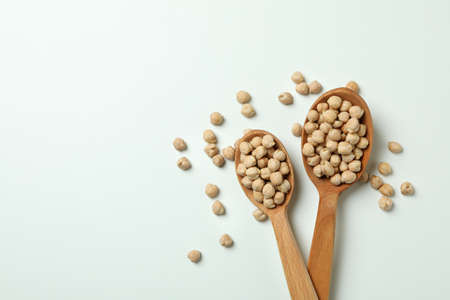 Spoons with fresh chickpea on white backgroundの写真素材