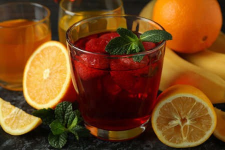 Concept of dessert with different jelly on black smokey tableの写真素材