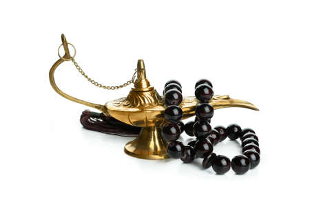 Ramadan lamp with prayer beads isolated on white background