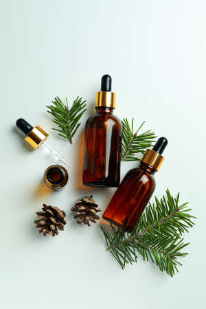 Flat lay with pine oil on white backgroundの写真素材