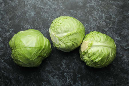 Fresh green cabbage on black smoky backgroundの写真素材