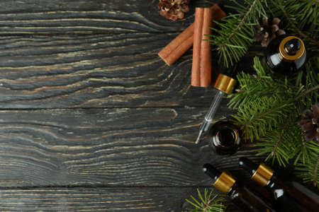 Aromatherapy concept with pine oil on wooden tableの写真素材
