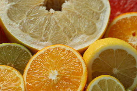 Ripe citrus on whole background, close upの写真素材