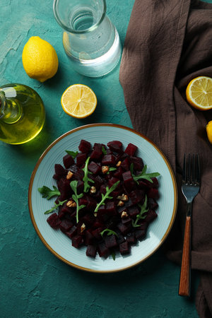 Concept of tasty eating with beet salad on green textured backgroundの写真素材