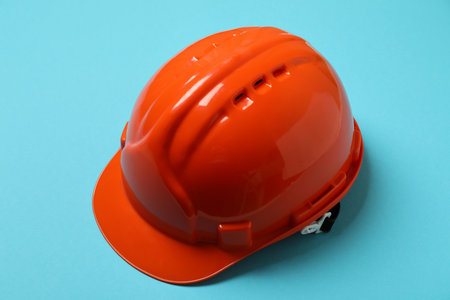 Hard hat on blue background, close upの写真素材