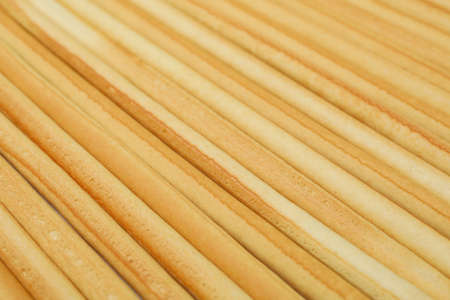 Grissini breadsticks on whole background, close upの写真素材