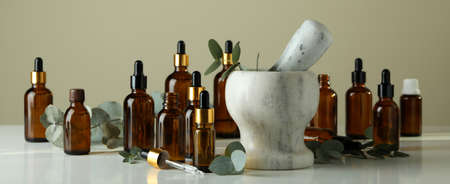 Concept of natural cosmetics with eucalyptus oil on white tableの写真素材