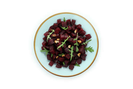Plate with fresh beet salad isolated on white backgroundの写真素材