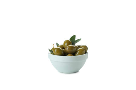 Bowl of green olives isolated on white backgroundの写真素材