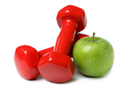 Dumbbells and apple isolated on white backgroundの写真素材