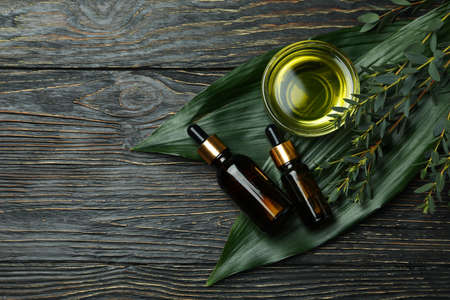Concept of natural cosmetics with eucalyptus oil on wooden tableの写真素材