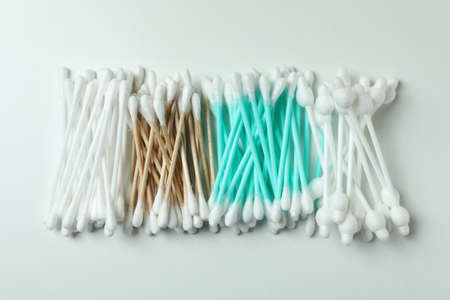 Different cotton swabs on white background, top viewの写真素材