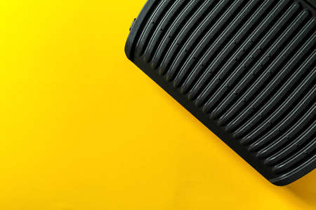 Modern electric grill on yellow background, space for textの写真素材