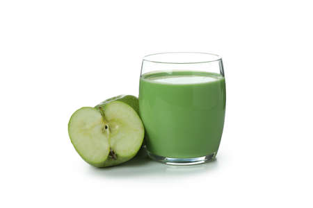 Glass of green smoothie and apples isolated on white backgroundの写真素材