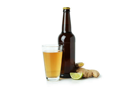 Glass and bottle of ginger beer on white backgroundの写真素材