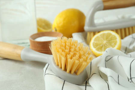 Cleaning concept with eco friendly cleaning tools on white textured tableの写真素材