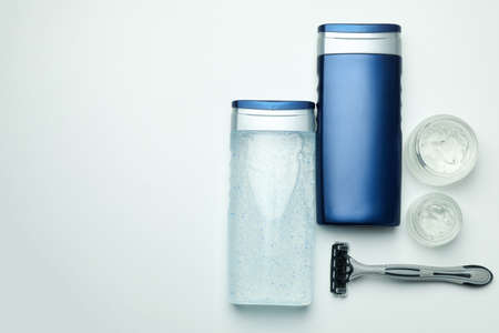 Concept of men's hygiene tools on white background