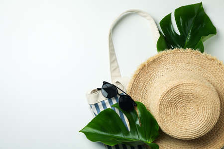 Summer accessories on white background, space for textの写真素材