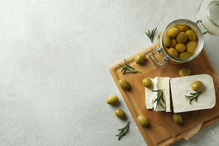 Concept of tasty food with feta cheese on white textured backgroundの写真素材