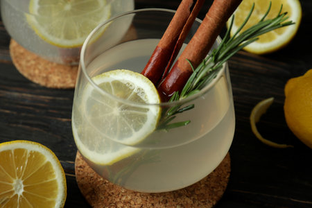 Glasses of lemonade on wooden background, close upの写真素材