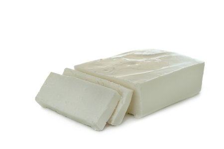Tasty feta cheese isolated on white backgroundの写真素材