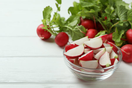 Fresh radish on white wooden background, space for textの写真素材