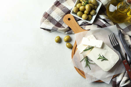 Concept of tasty food with feta cheese on white textured backgroundの写真素材