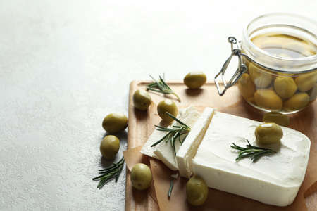 Concept of tasty food with feta cheese on white textured backgroundの写真素材