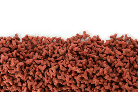 Red animal feed isolated on white background