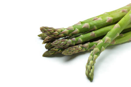 Fresh green asparagus isolated on white backgroundの写真素材