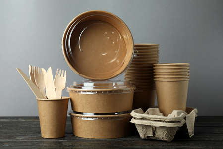 Delivery containers for takeaway food on wooden tableの写真素材