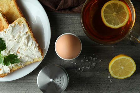 Concept of tasty breakfast with boiled egg, top view