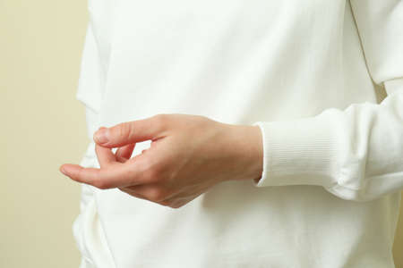 Young woman in white sweatshirt, close up