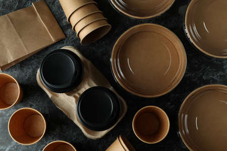 Delivery containers for takeaway food on black smokey tableの写真素材