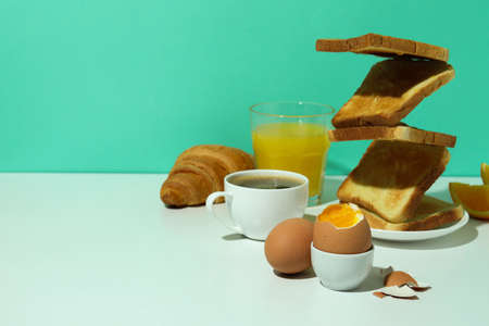 Concept of tasty breakfast with boiled eggs, space for textの写真素材