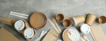 Delivery containers for takeaway food on gray textured tableの写真素材