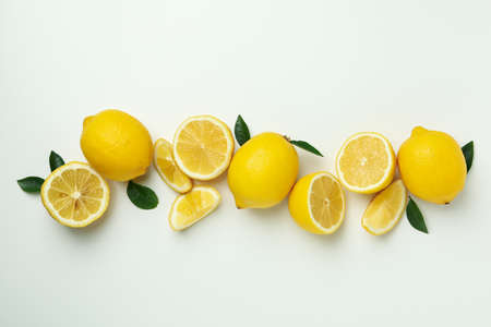 Ripe lemons on white background, space for textの写真素材