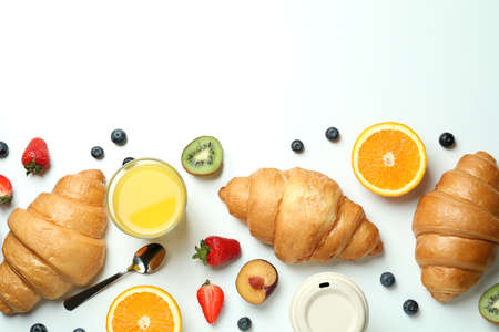 Concept of tasty breakfast with croissants on white backgroundの写真素材