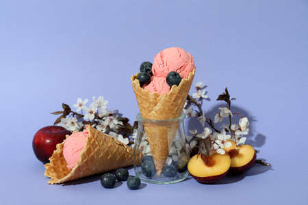 Concept of fruit ice cream on violet background