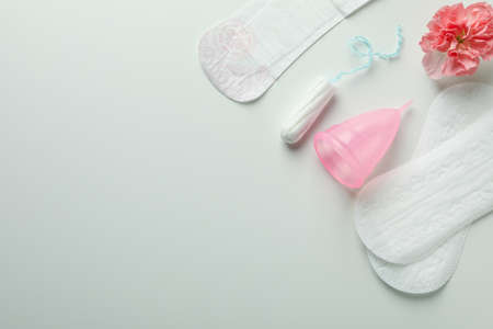 Concept of menstruation on white background, space for text