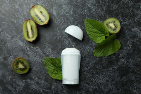 Blank kiwi deodorant on black smokey backgroundの写真素材