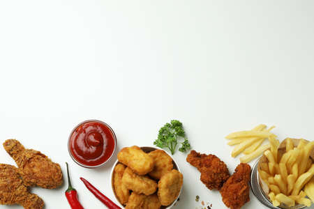 Concept of tasty eating with fried chicken on white backgroundの写真素材