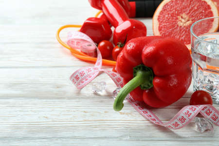 Healthy lifestyle accessories on white wooden tableの写真素材