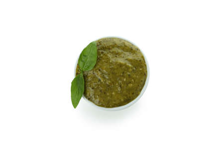 Bowl of Pesto sauce isolated on white backgroundの写真素材