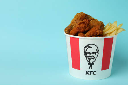 ODESSA, UKRAINE - MAY 31 2021: Bucket of KFC on blue backgroundのeditorial素材