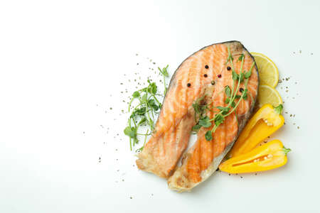 Tasty grilled salmon and ingredients on white backgroundの写真素材