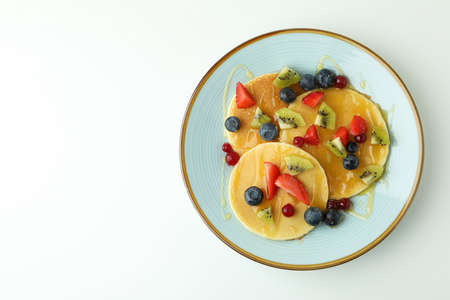 Concept of delicious dessert with pancakes on white backgroundの写真素材